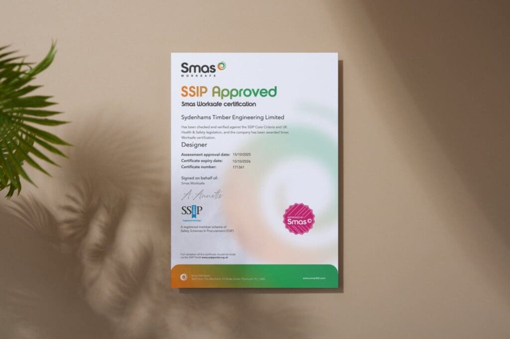 SSIP accreditation certificate from Smas Worksafe on a wall, highlighting Sydenhams Timber Engineering safety.