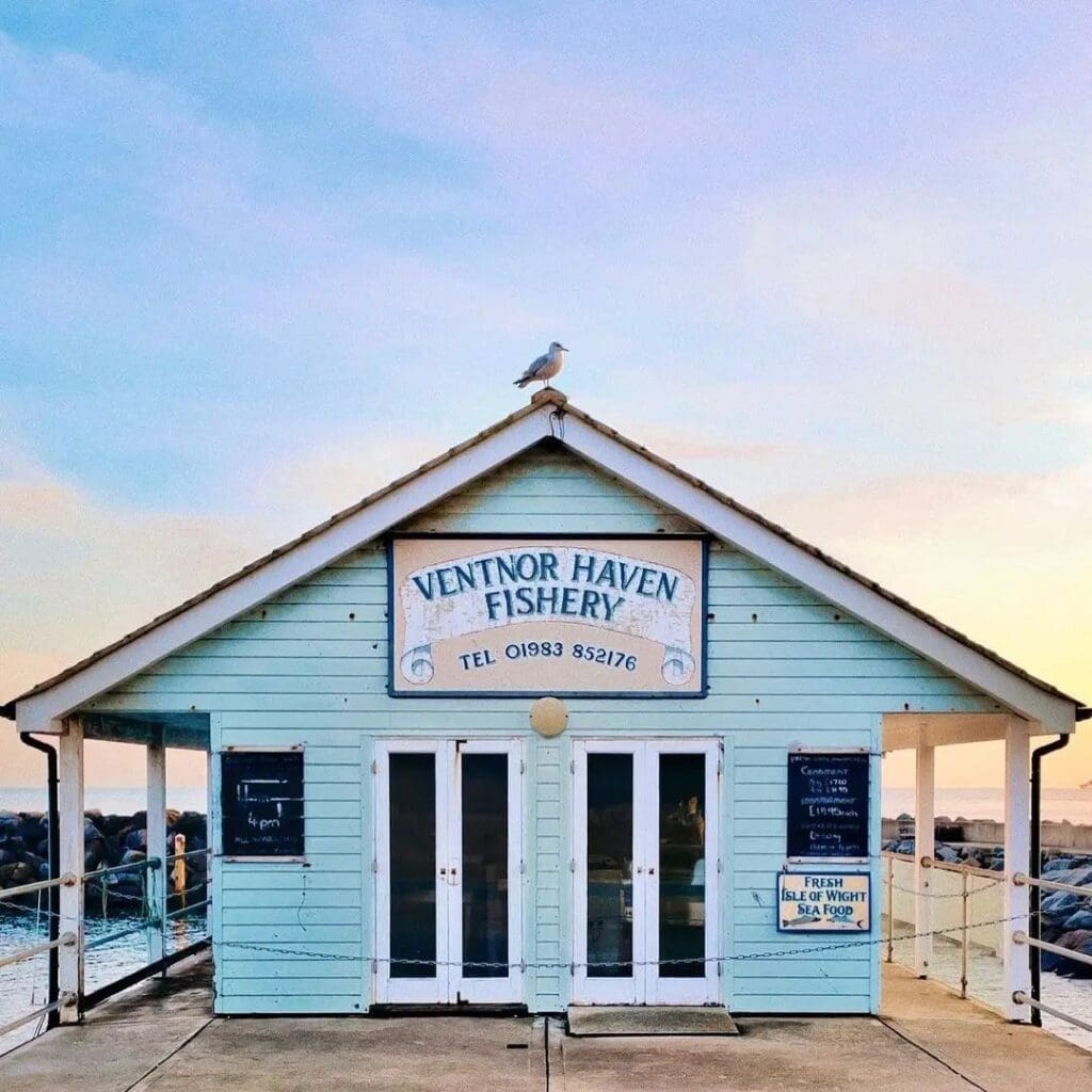 Ventnor Haven Fishery building at sunrise, highlighting a durable coastal timber frame on the Isle of Wight.